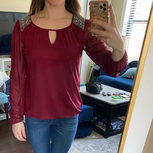 Maroon top with silver embellished sleeves